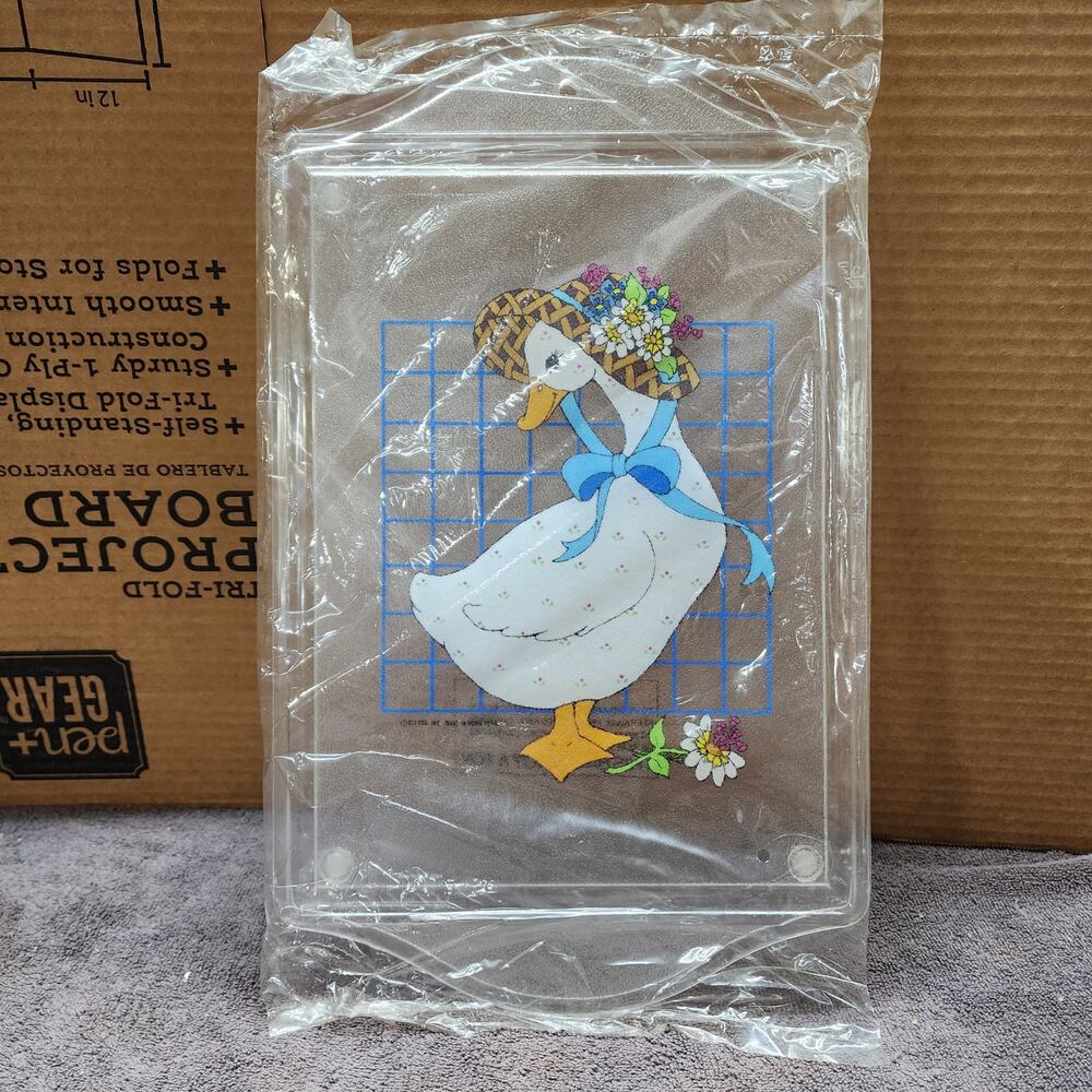 New Plastic duck in a bonnet cutting board b48